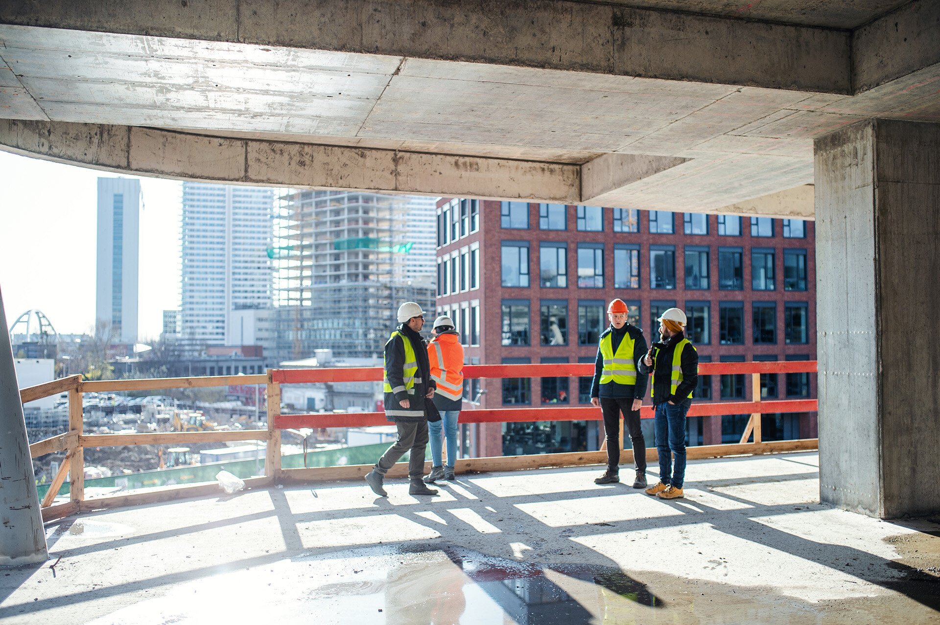 Team of professionals collaborating at a construction site